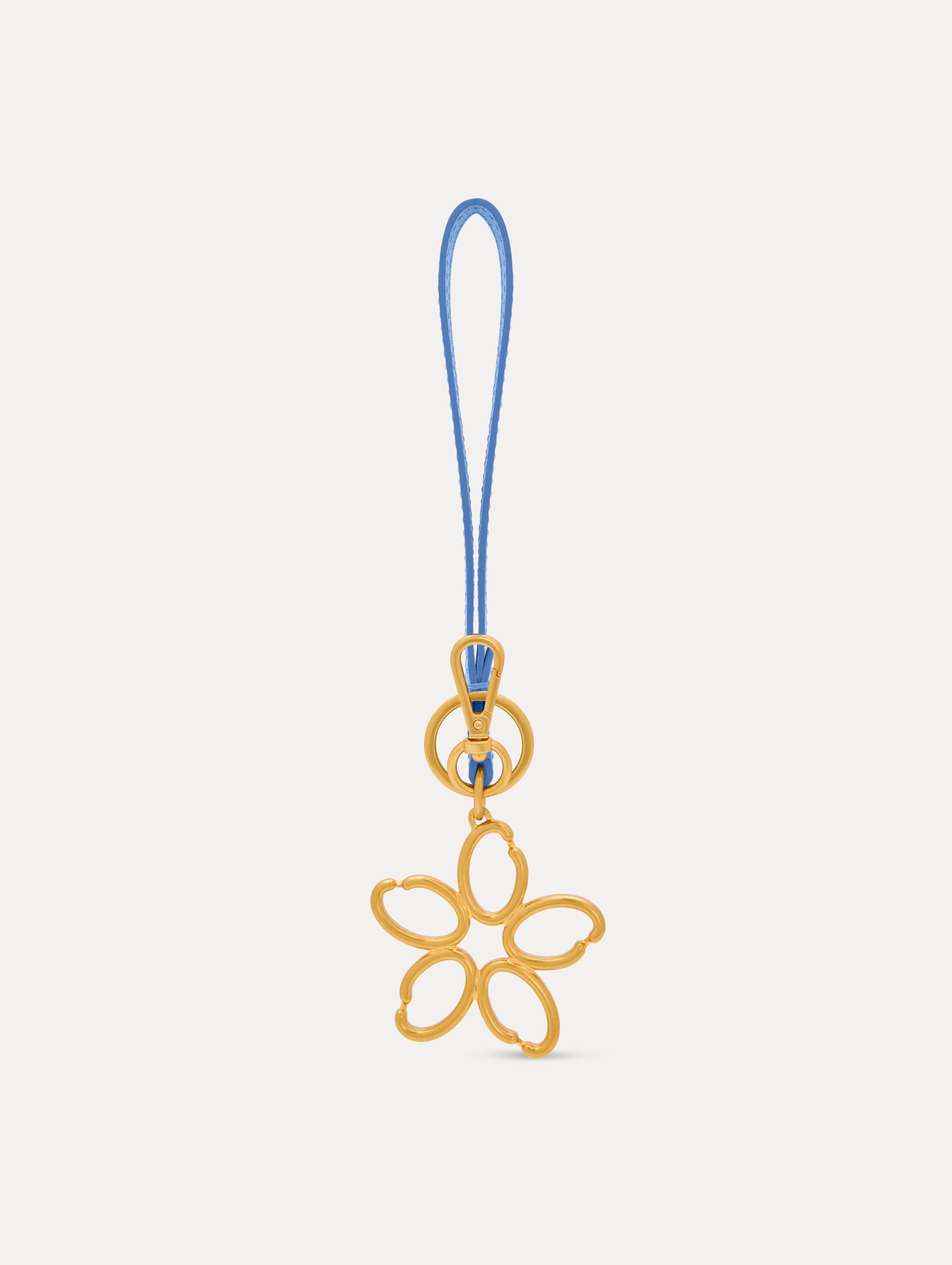 Gold O Flower Wristlet Key Chain with five open petals hangs from a blue leather loop strap, attached by a small gold ring and clasp. Back View.