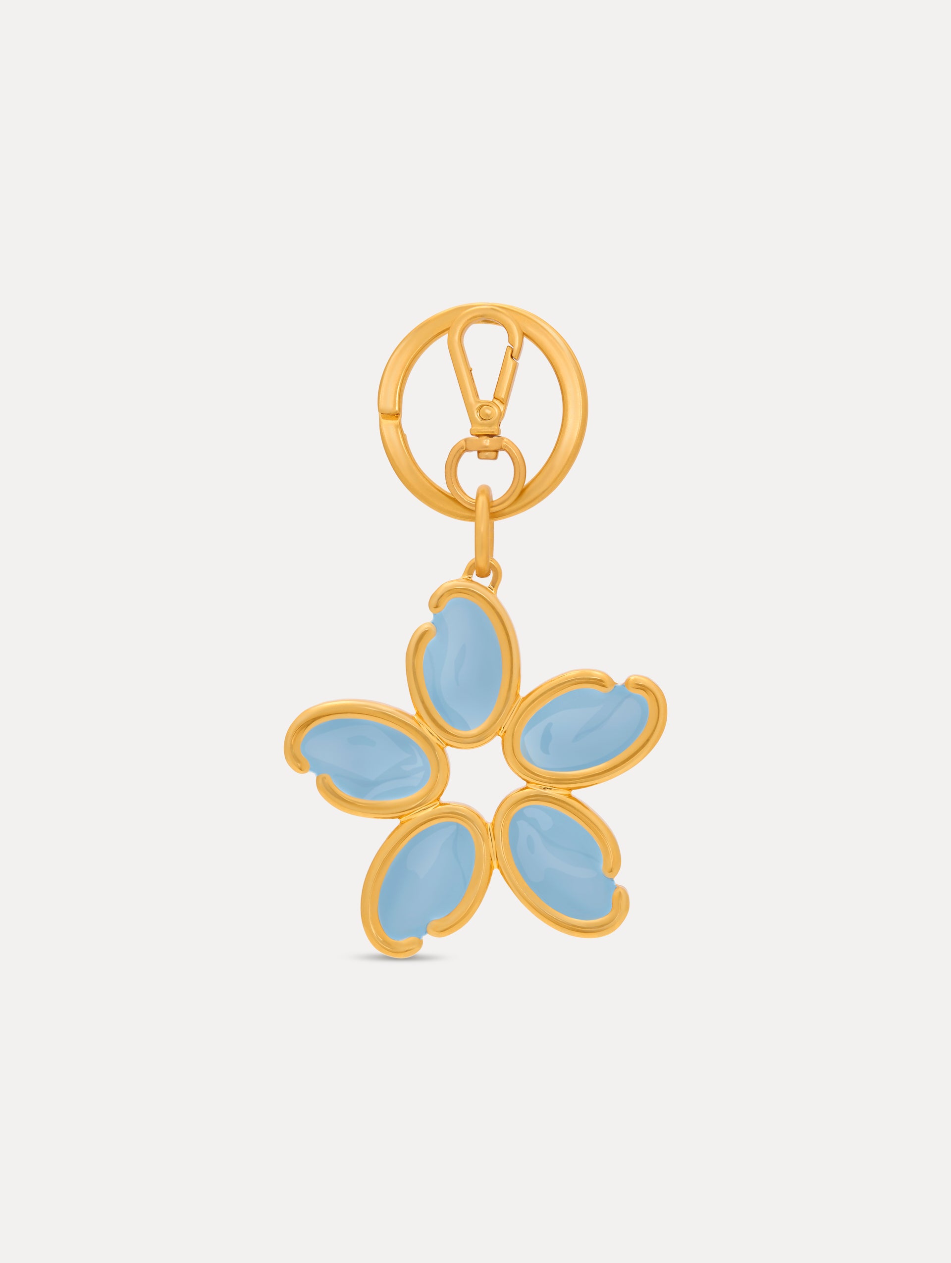 Gold Enamel O Flower Key Chain featuring a five-petal flower charm with smooth, light blue enamel inlays framed by rounded gold edges, attached to a circular clasp. Front View.