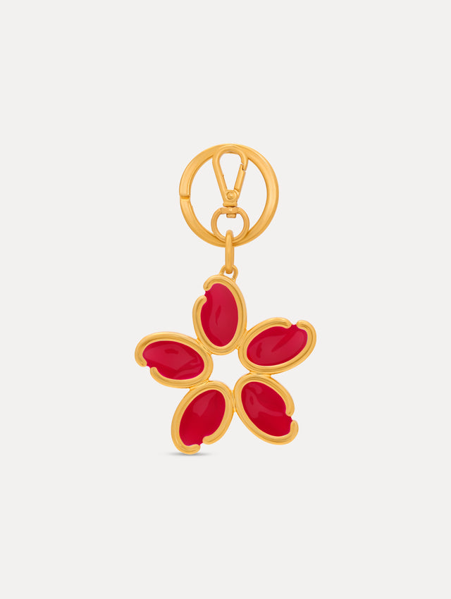 Gold Enamel O Flower Key Chain featuring a five-petal flower charm with smooth, red inlays framed by rounded gold edges, attached to a circular clasp. Front View.