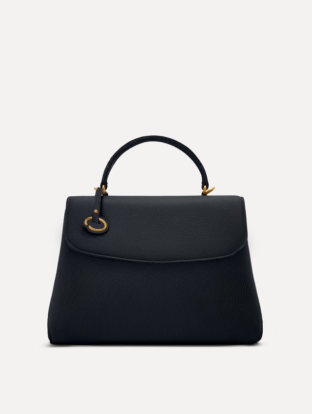 The Poppy leather bag in dark navy with O logo tag around the top handle. Front View