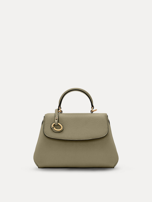 The Mini Poppy top handle bag in green. Front View.