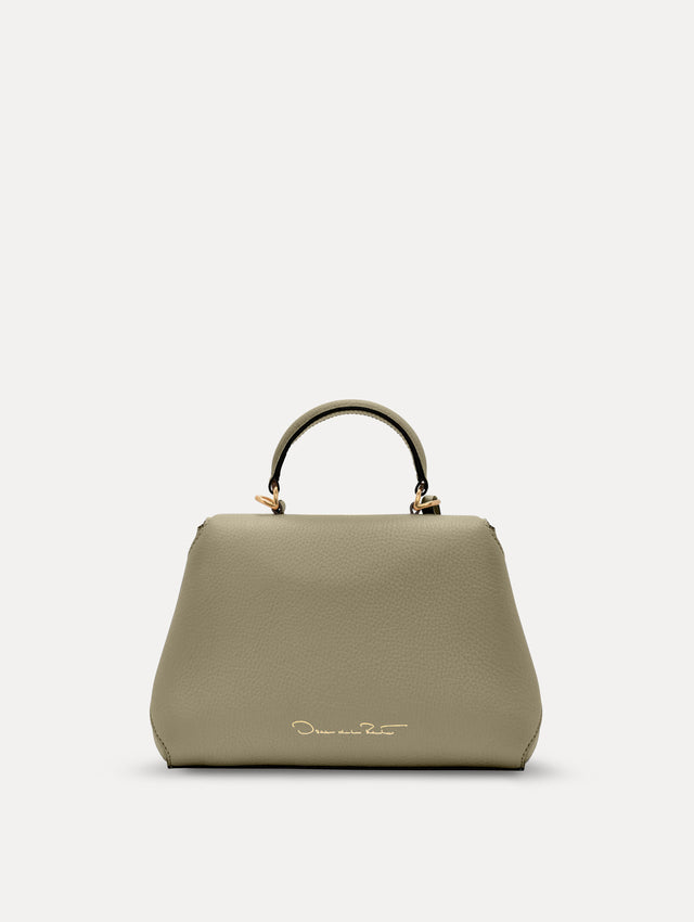 The Mini Poppy top handle bag in green. Back view. 