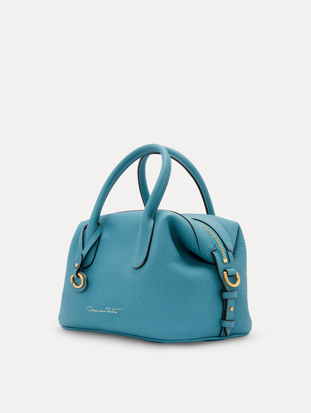 The Mini Dahlia Leather Handbag in Blue with O Logo tag around Top Handle Side View