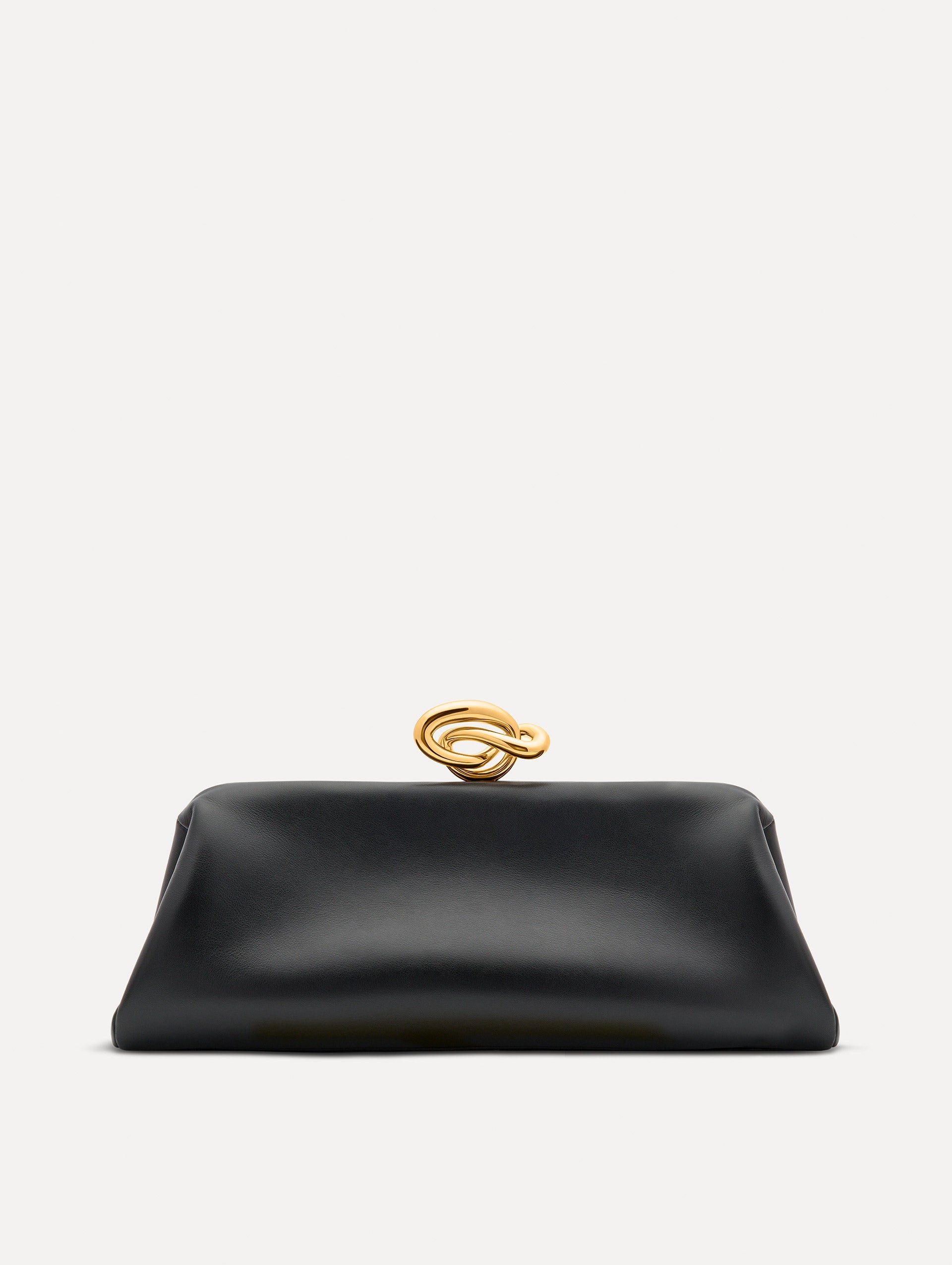 Black clutch with gold 'O' emblem on the clasp. 