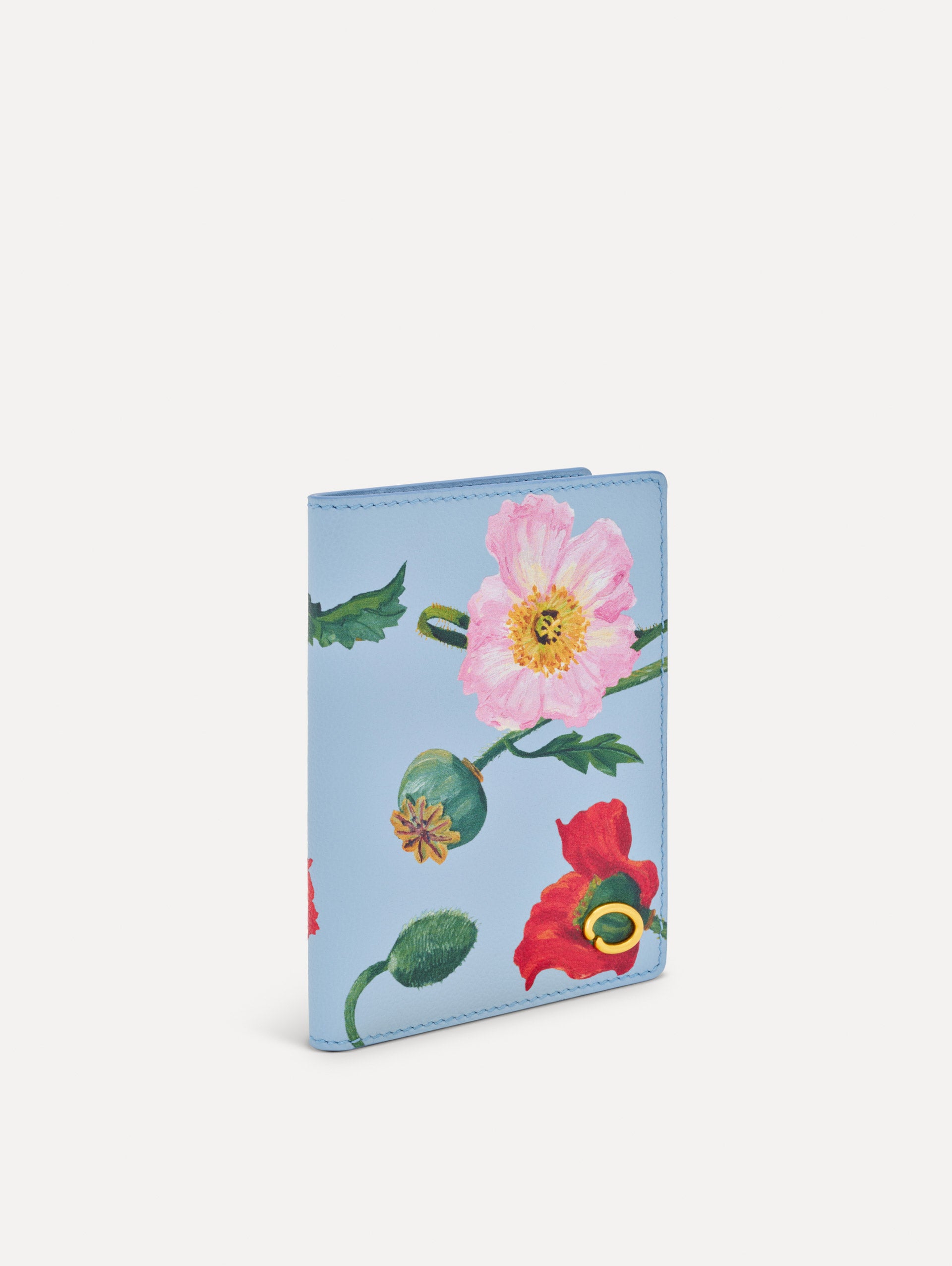 Blue Poppy-Printed Passport Cover with pink and red poppy floral motifs. Side view.