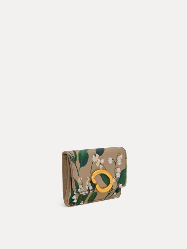 Beige Lily of the Valley–Printed Card Case with green and white floral motifs and a gold O motif clasp. Side View.