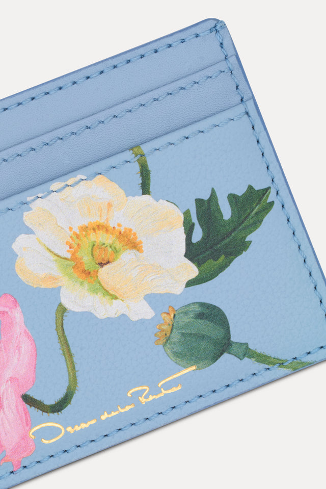 Blue Poppy Printed Card case featuring white and pink poppy floral motifs. Zoom View.