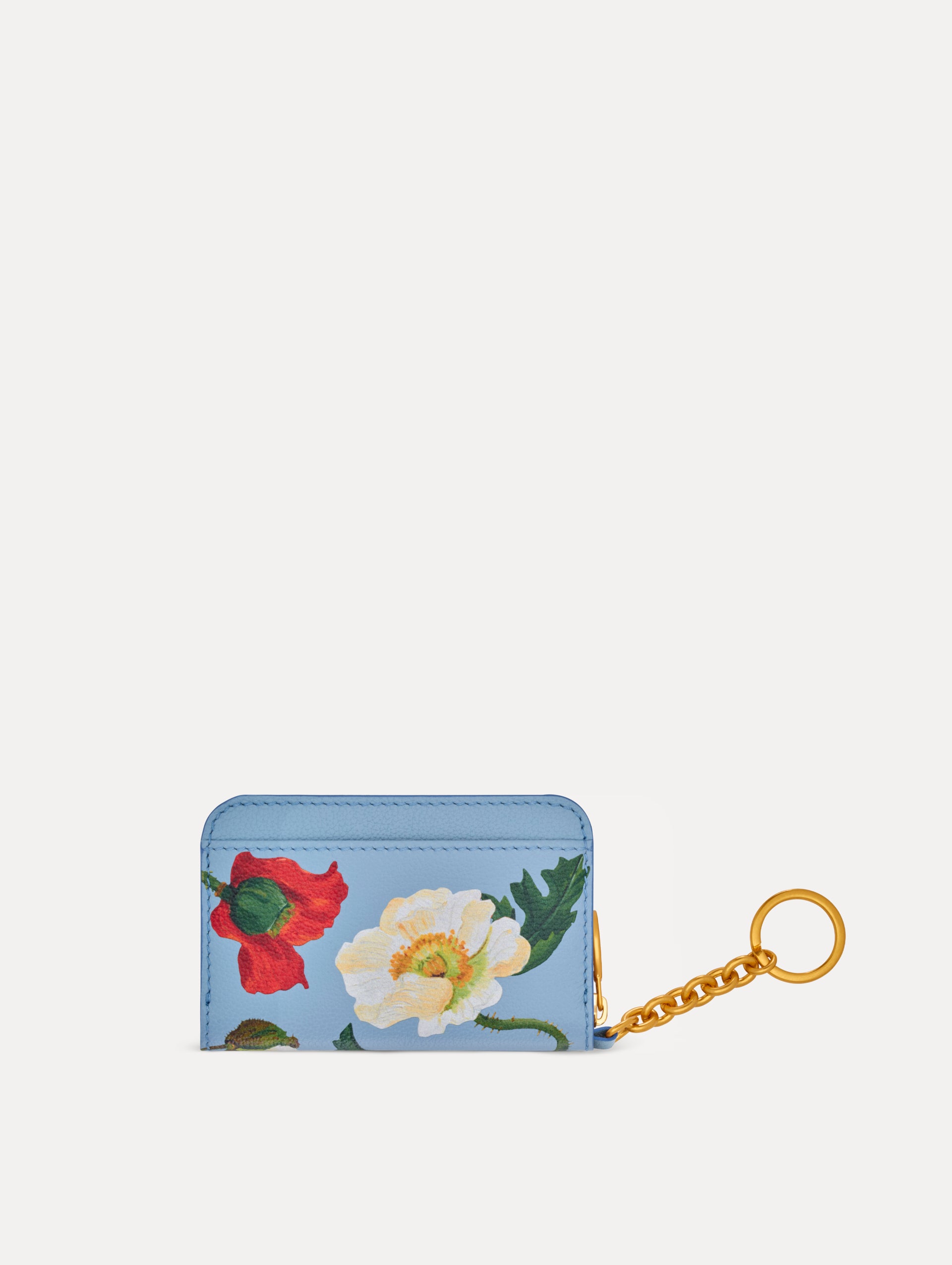 Blue Poppy Printed Zip Card case with white and red floral motifs and gold hardware. Front View.