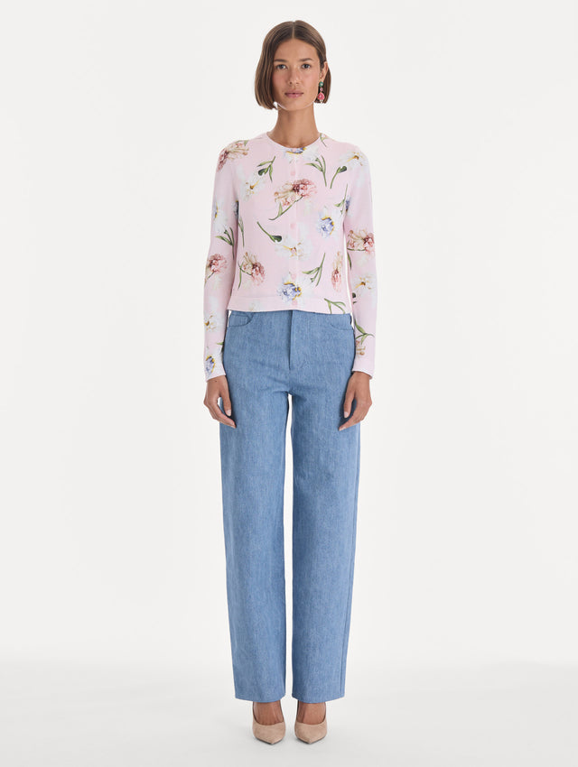 The model is wearing a printed twinset cardigan. Front view.