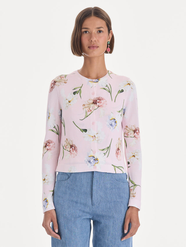 The model is wearing a printed twinset cardigan. Front view.