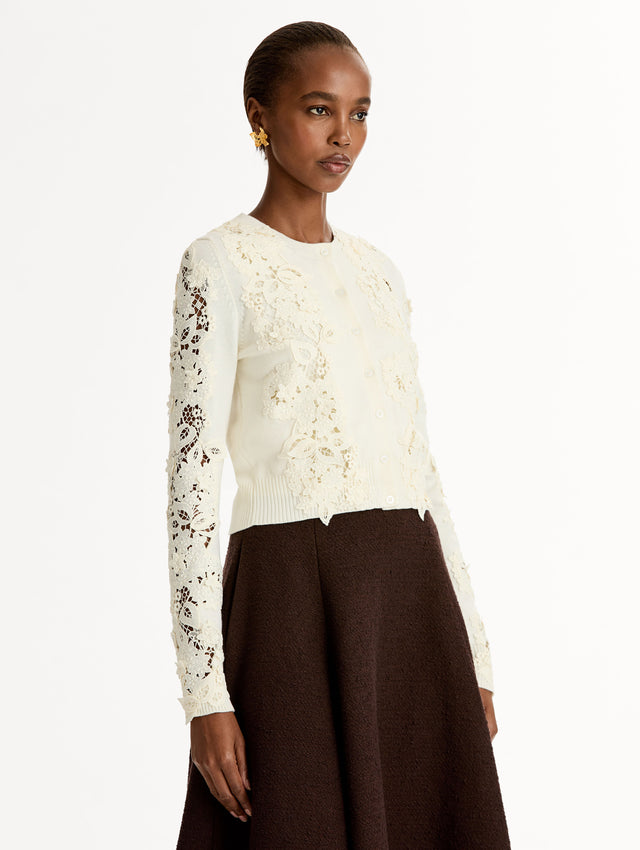 Ivory Long Sleeve Button Knit Cardigan, Knit. Porcelain flower guipure lace paneled front. Button-front. Side View. 