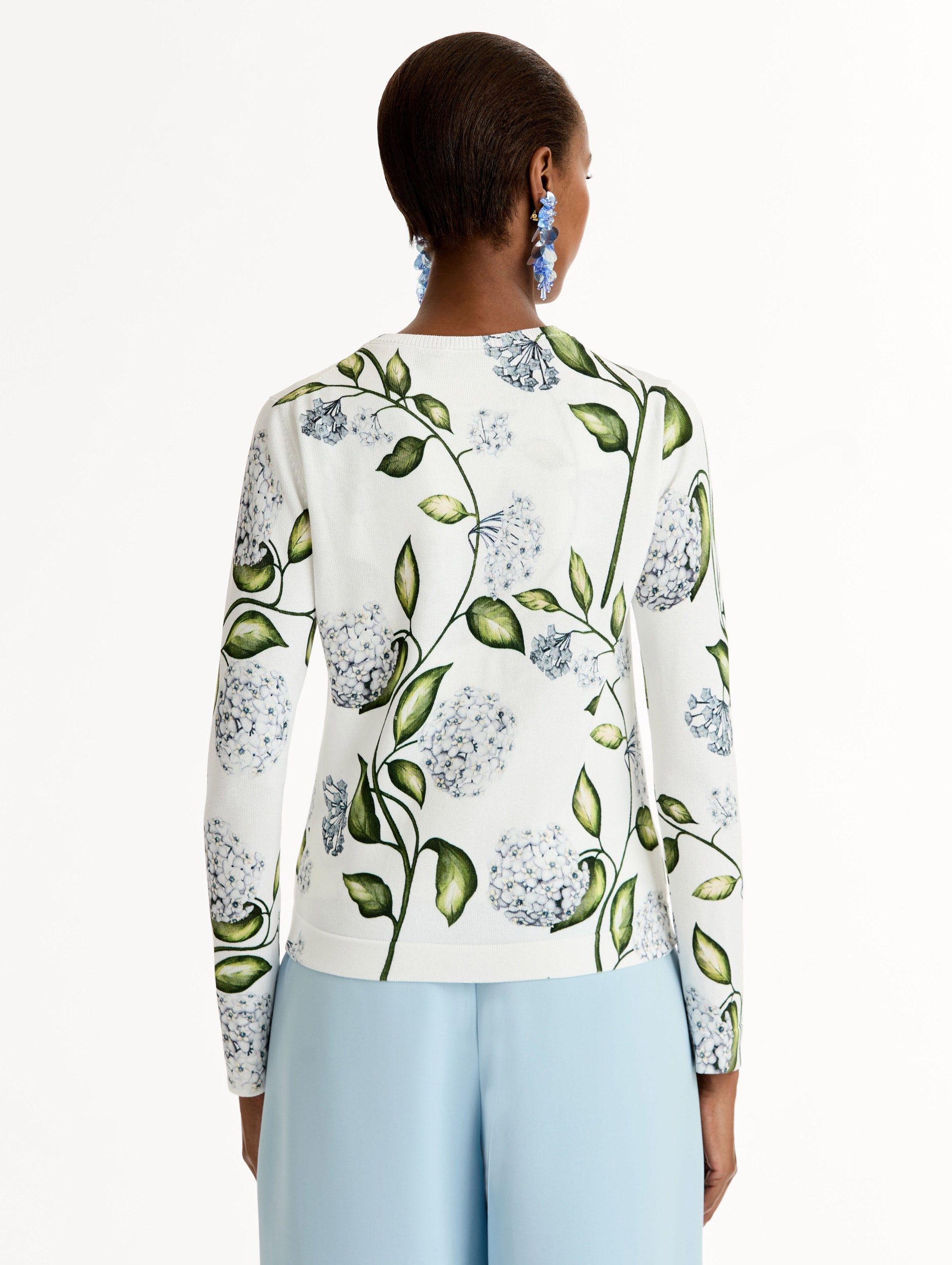 Classic ribbed-knit long sleeve cardigan with Porcelain motif.Crew neckline and banded trim. Back View.