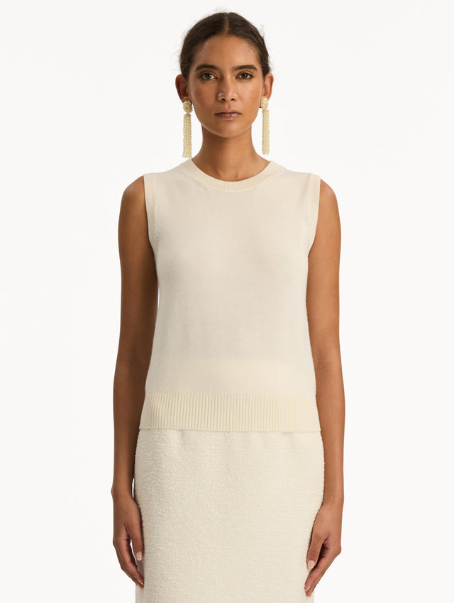 Ivory Virgin Wool Tank featuring a crew neckline and ribbed hem. Front View.