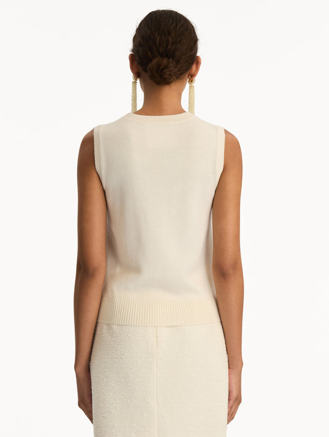 Ivory Virgin Wool Tank featuring a crew neckline and ribbed hem. Back View.