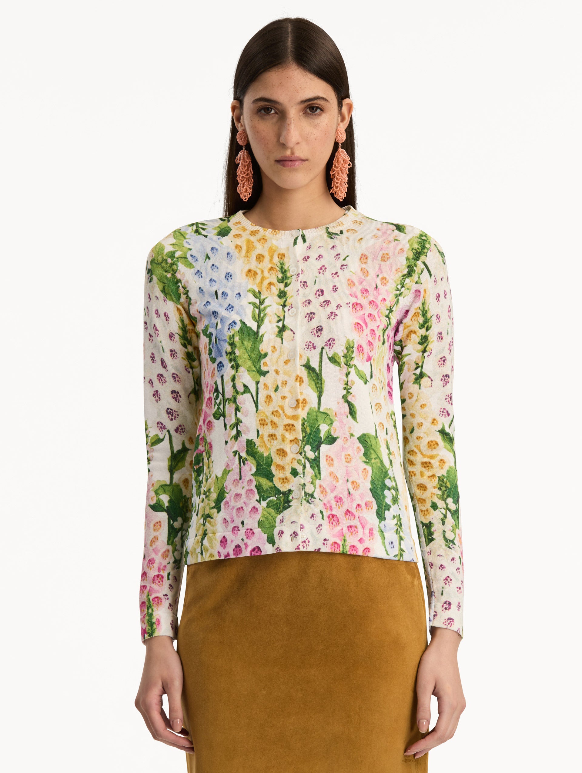 White Foxglove Printed Cardigan featuring multicolor foxglove motifs in yellow, pink, and green. Front View.