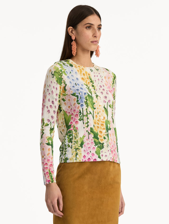 White Foxglove Printed Cardigan featuring multicolor foxglove motifs in yellow, pink, and green. Side View.