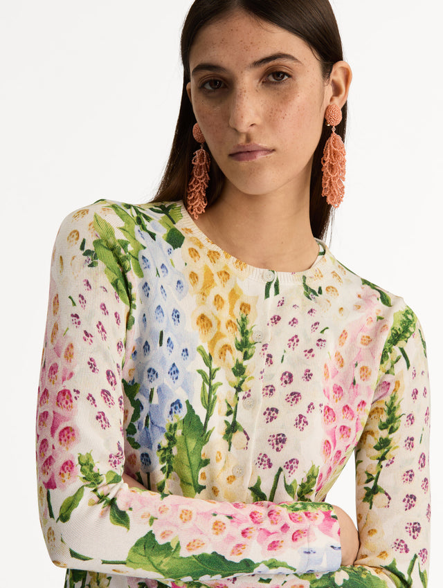 White Foxglove Printed Cardigan featuring multicolor foxglove motifs in yellow, pink, and green. Zoom View.