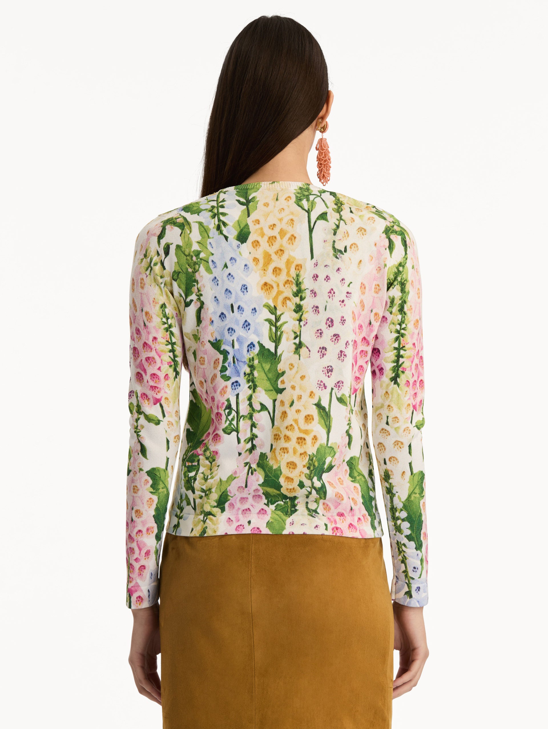 White Foxglove Printed Cardigan featuring multicolor foxglove motifs in yellow, pink, and green. Back View.