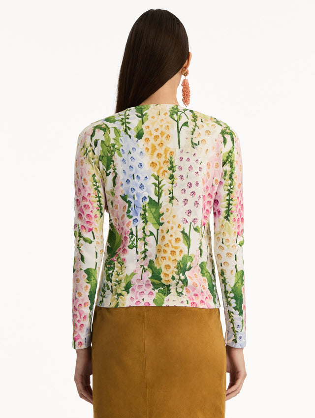 White Foxglove Printed Cardigan featuring multicolor foxglove motifs in yellow, pink, and green. Back View.