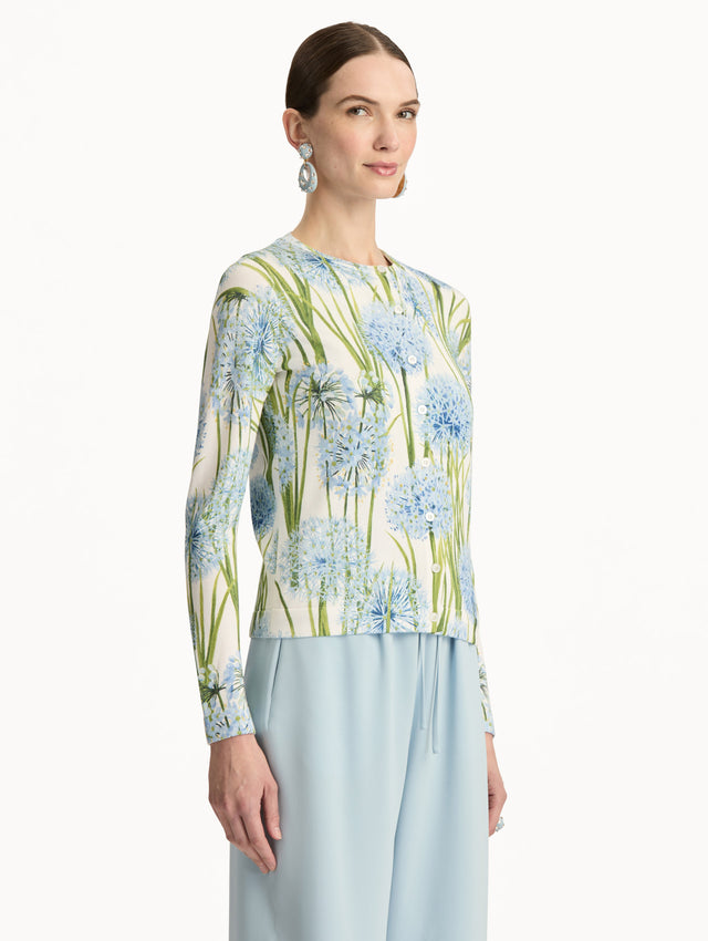 Ivory Allium Printed Cardigan with blue and green floral motifs. Side View.