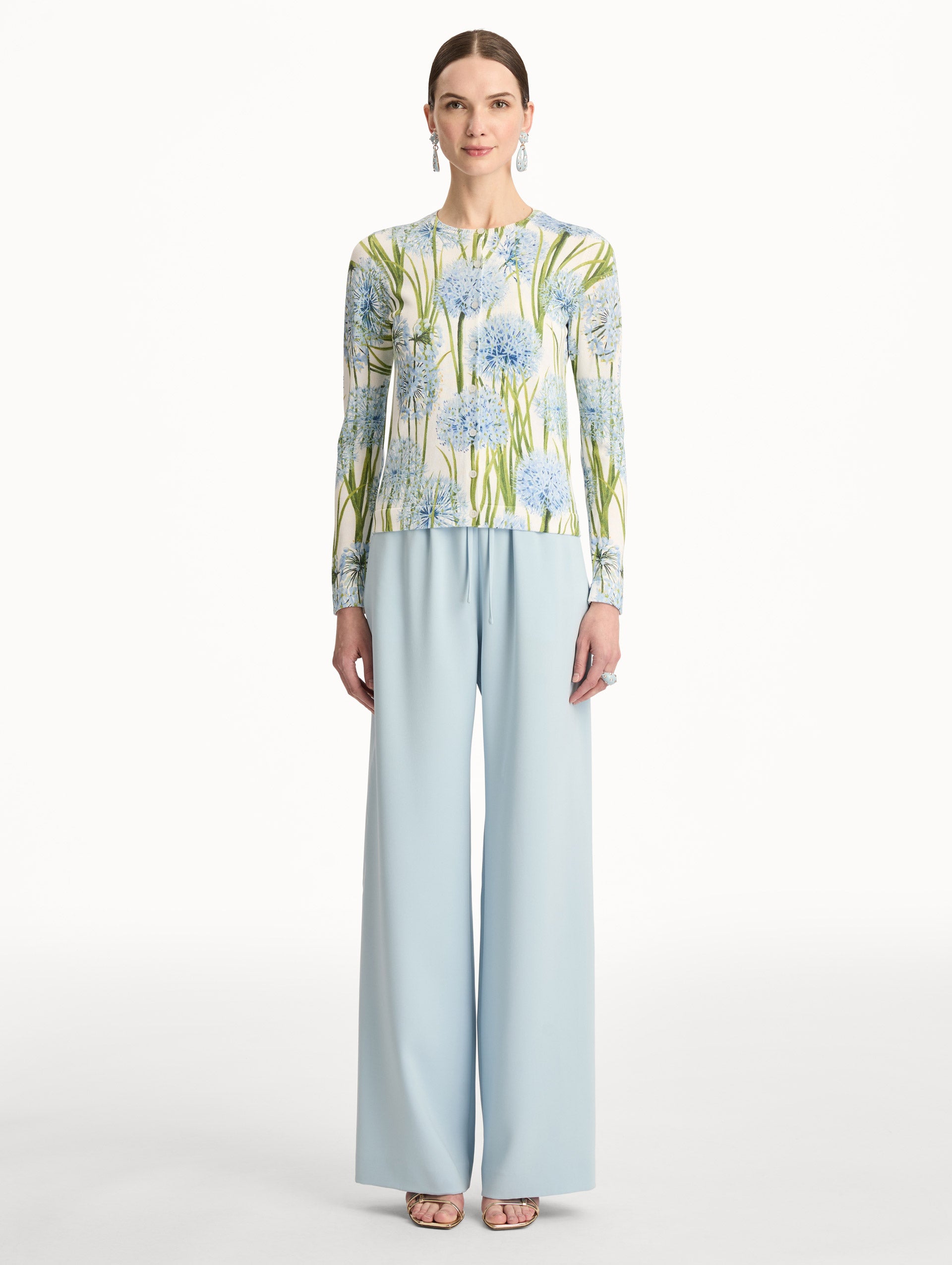 Ivory Allium Printed Cardigan with blue and green floral motifs. Front View.