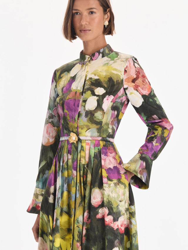 The model is wearing a long sleeve abstract garden poplin sateen dress. Zoom view.