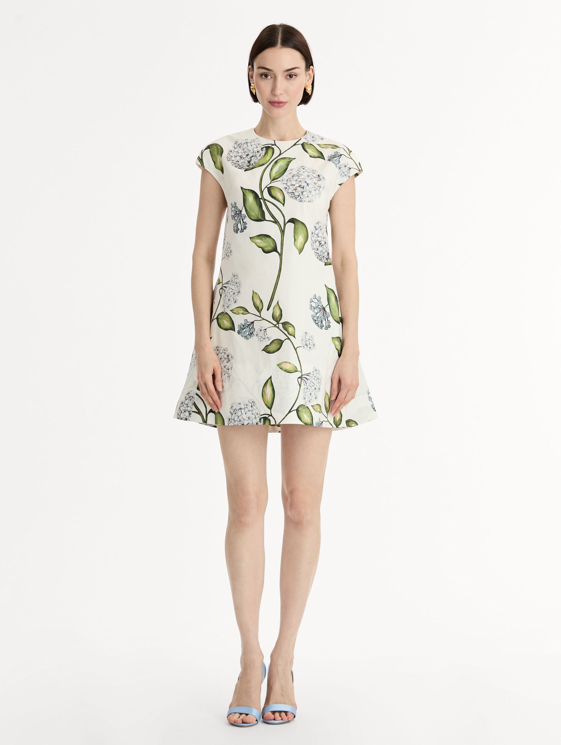 Porcelain Flower Cotton Poplin A-Line Mini Dress. Short Sleeves. Blue and Green Floral Motif. Front View.