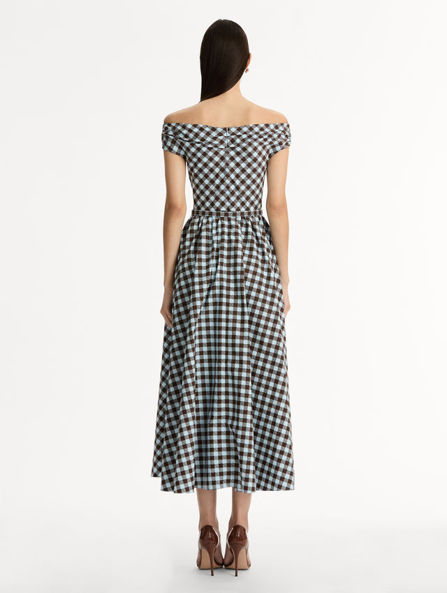 Gingham Cotton Poplin Midi Dress  in ice blue and mahogany. Off-shoulder neckline and pleated skirt. Back View. 