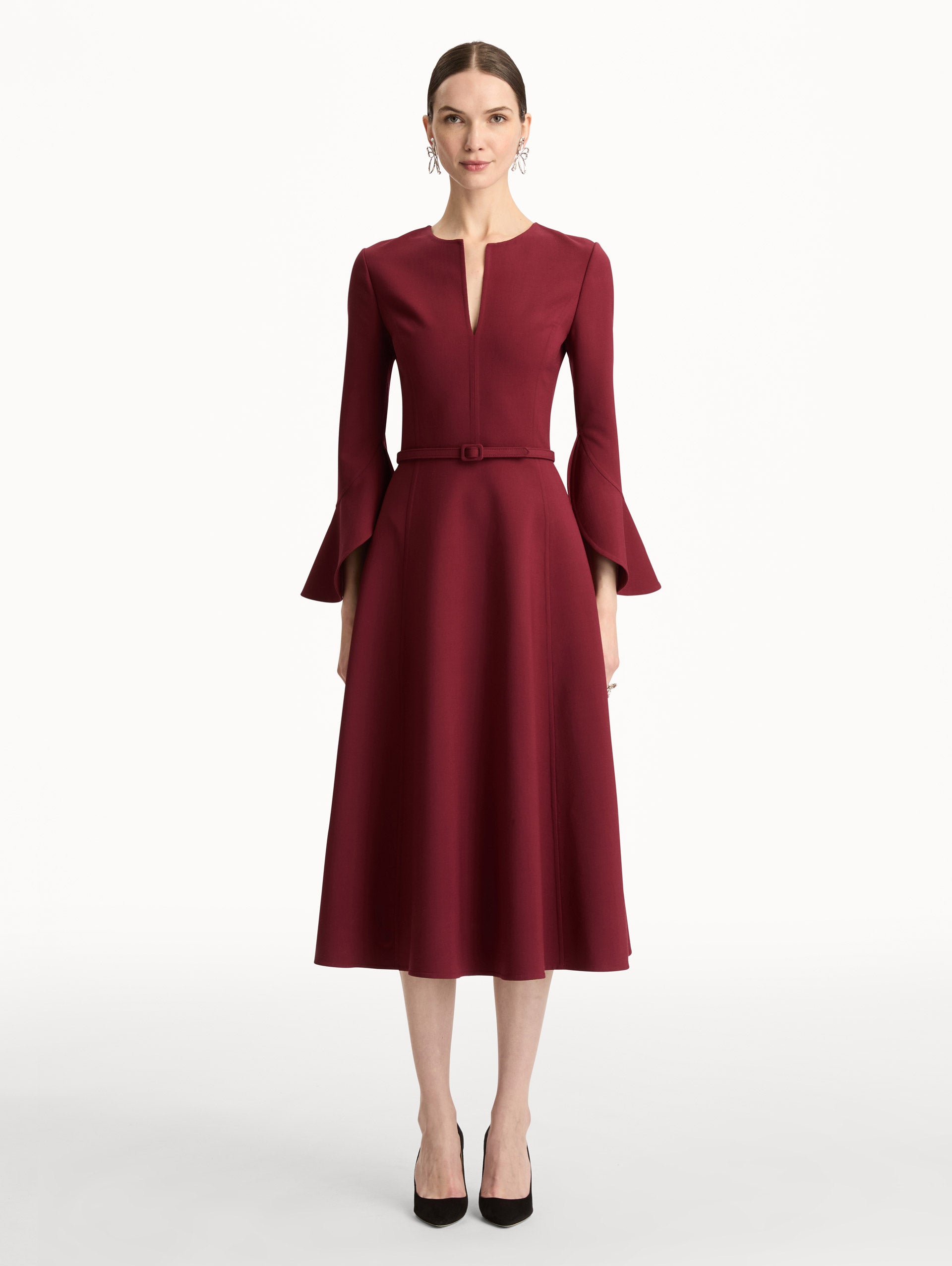 Wine colored Split Neck Wool Dress with belted waist and flowing bell sleeves. Front View.