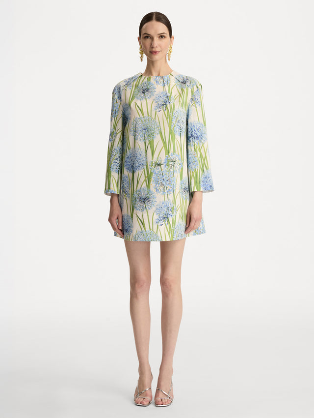 White Allium Cotton Poplin Long Sleeve Shift Dress with blue and green floral motifs. Front View.