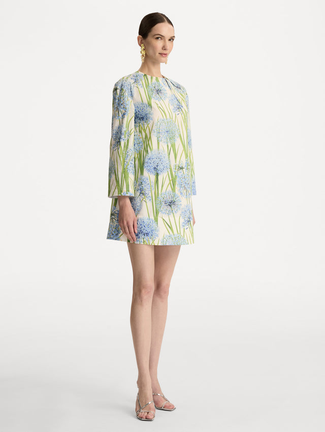 White Allium Cotton Poplin Long Sleeve Shift Dress with blue and green floral motifs. Side View.