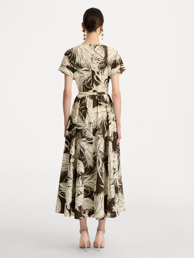 Ivory and Brown Feather Cotton Poplin Dress with short sleeves, fitted waist, and full skirt, featuring bold feather print throughout. Back View.