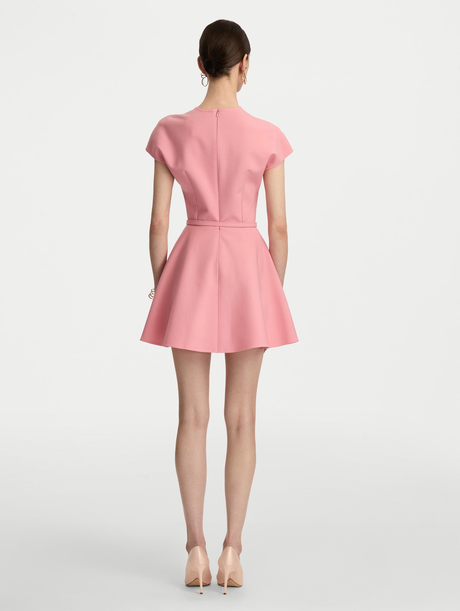 Pink Split Neck Wool Mini Dress with felted waist and flared skirt. Back View.