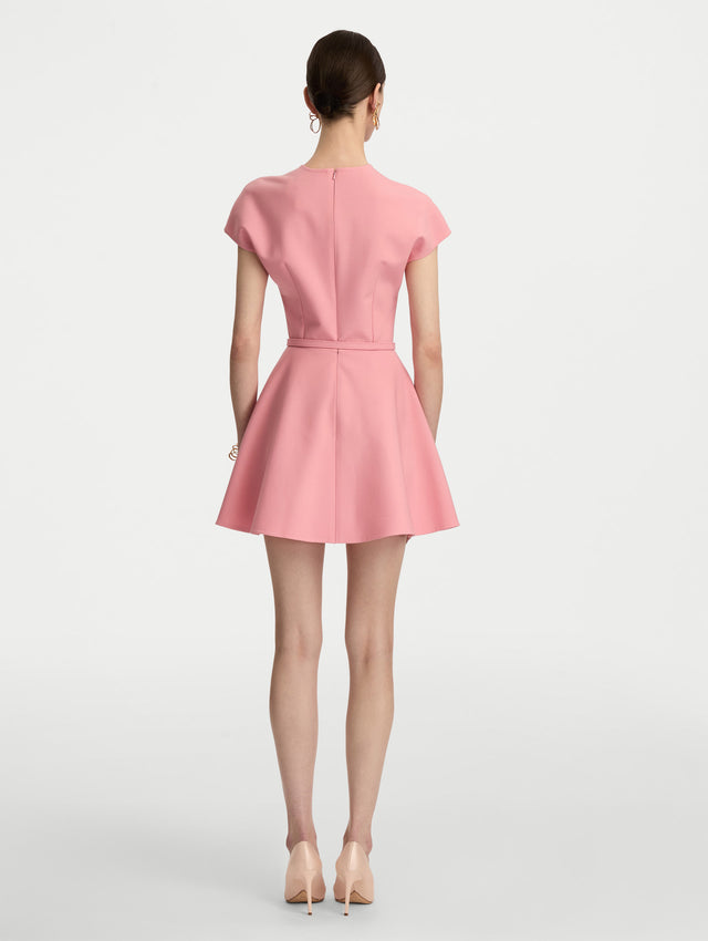 Pink Split Neck Wool Mini Dress with felted waist and flared skirt. Back View.