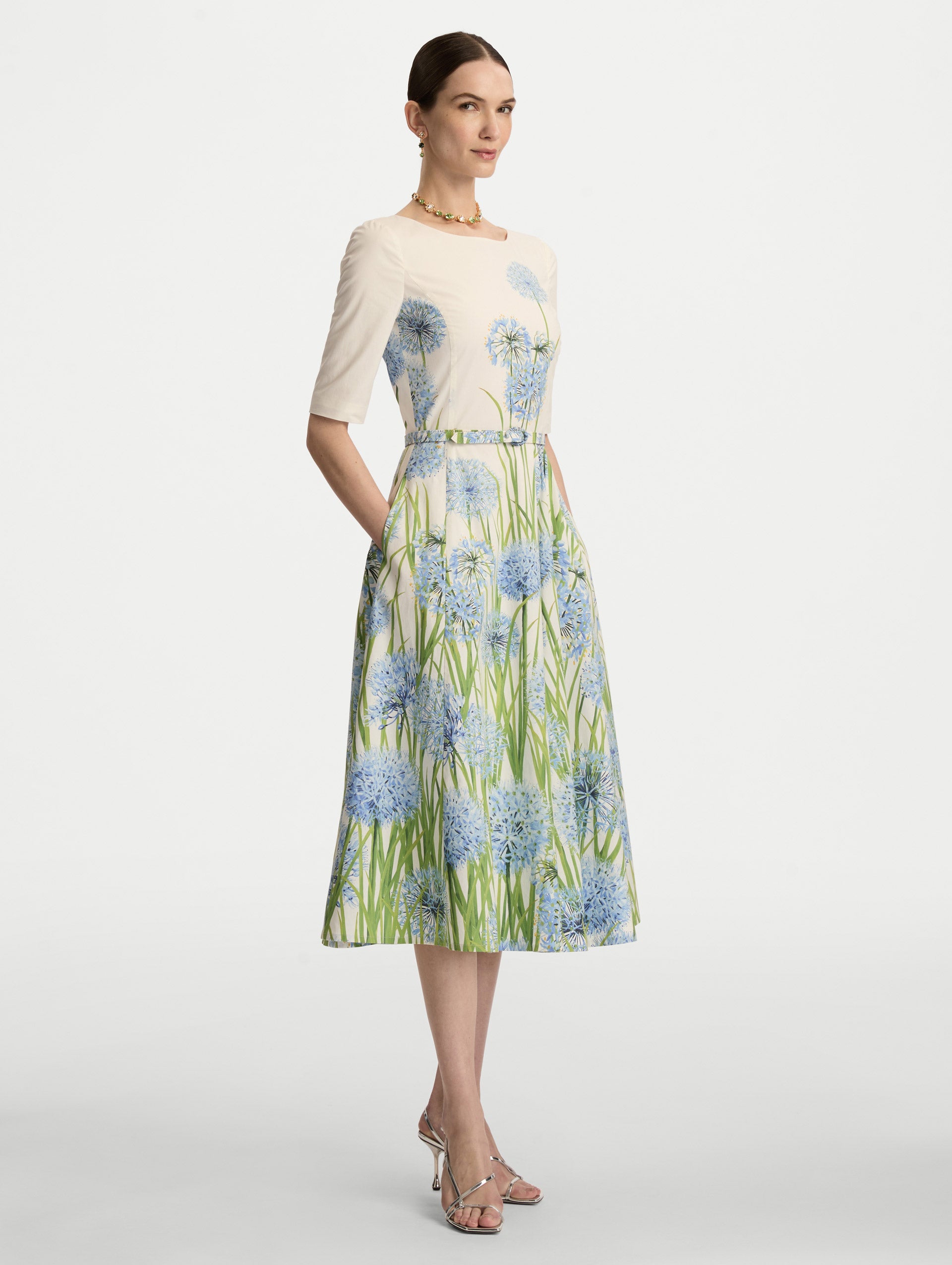 Ivory Degradé Allium Cotton Poplin Dress with three quarter sleeves and a belted waist. Side View.