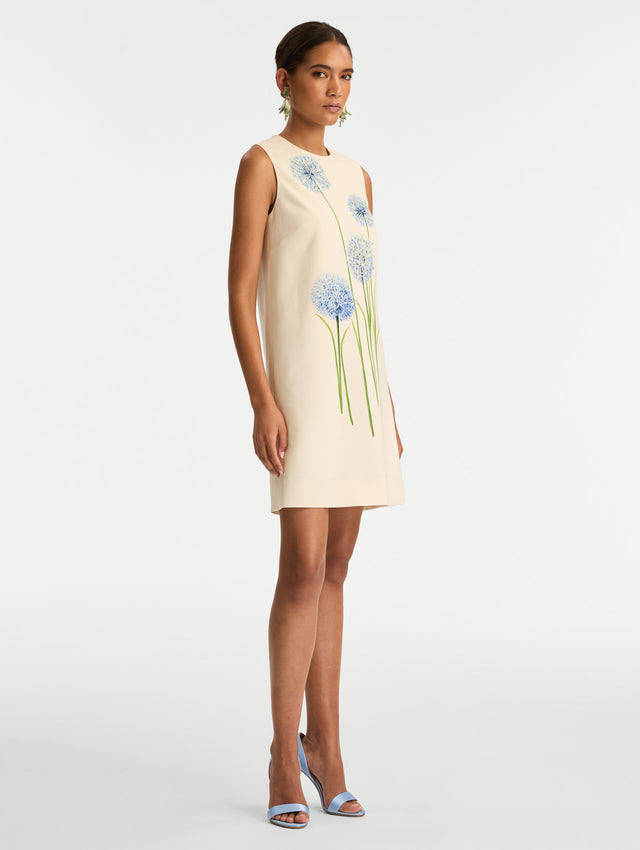 Ivory Allium Wool Shift Dress featuring a blue allium floral print accents on the front. Side View.