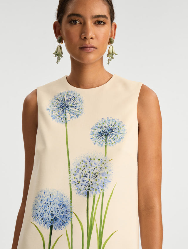 Ivory Allium Wool Shift Dress featuring a blue allium floral print accents on the front. Zoom View.
