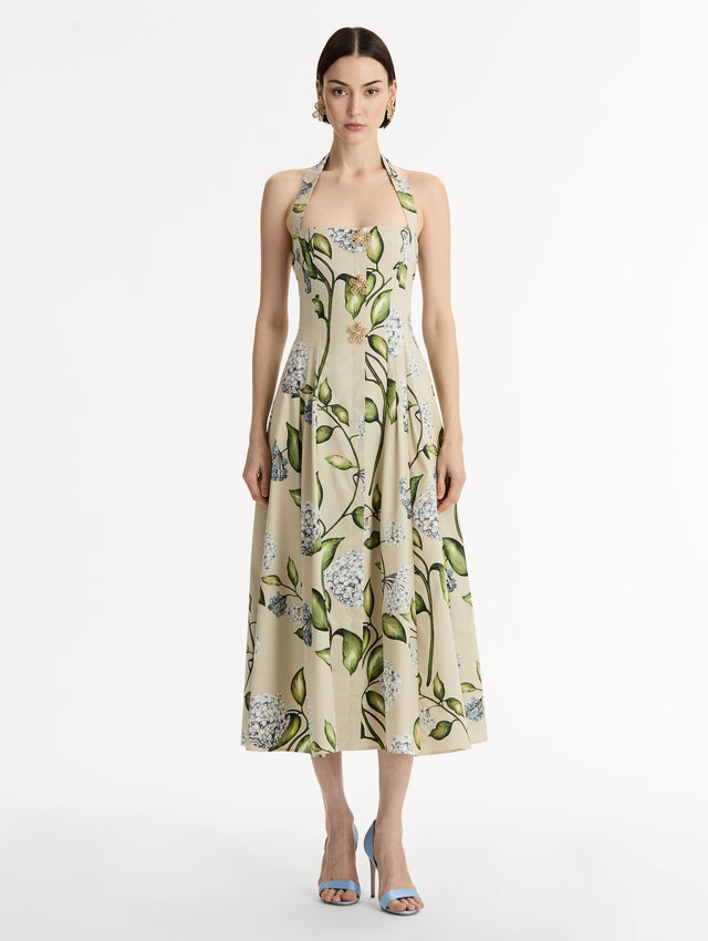 Cotton Poplin Halter Neck Midi Dress. Three Gold Floral Buttons at Front. Blue and Green Florals. Front View.