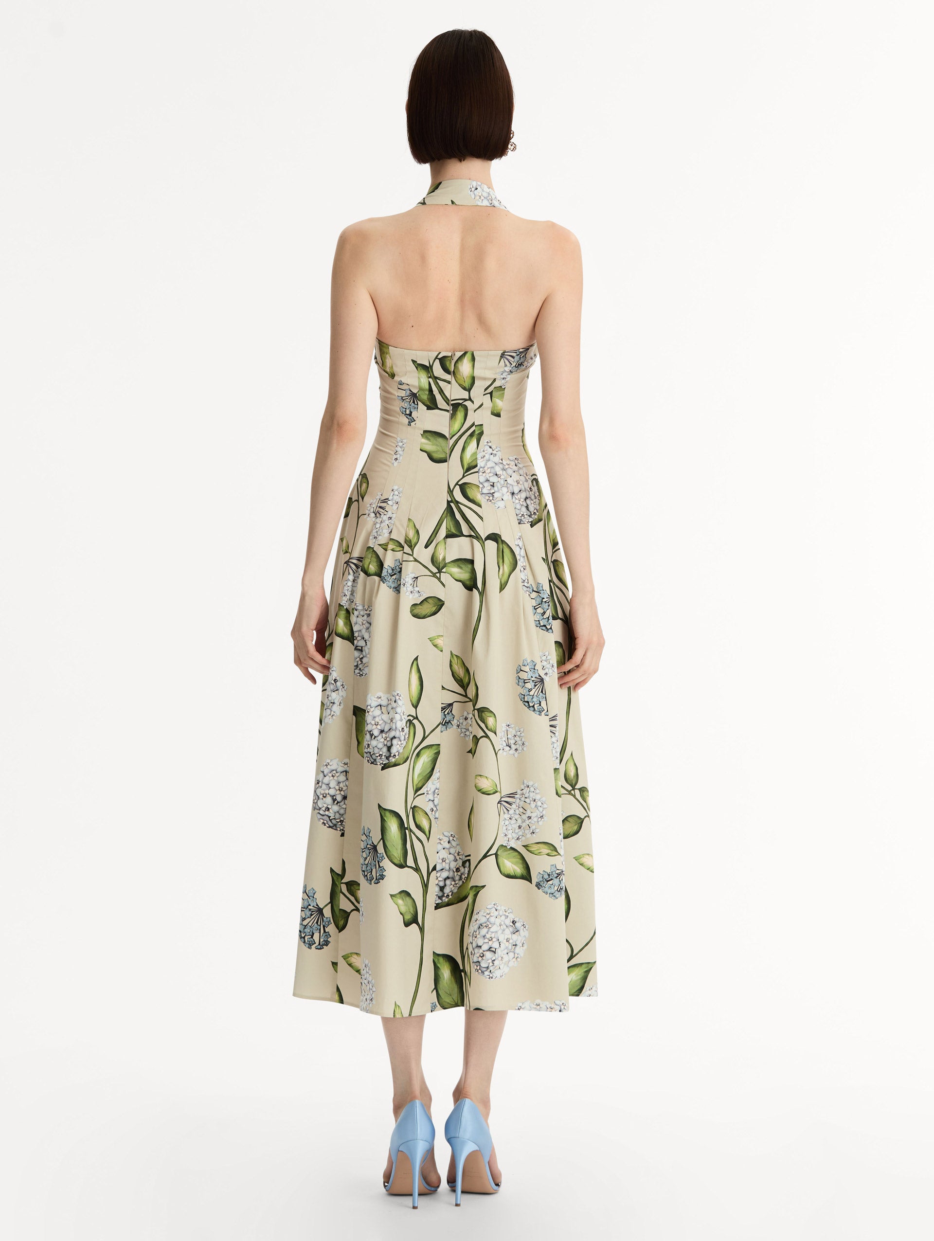 Cotton Poplin Halter Neck Midi Dress. Three Gold Floral Buttons at Front. Blue and Green Florals. Back View.