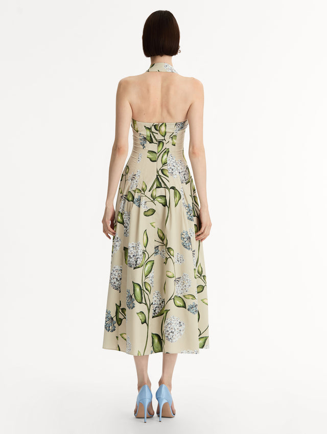 Cotton Poplin Halter Neck Midi Dress. Three Gold Floral Buttons at Front. Blue and Green Florals. Back View.