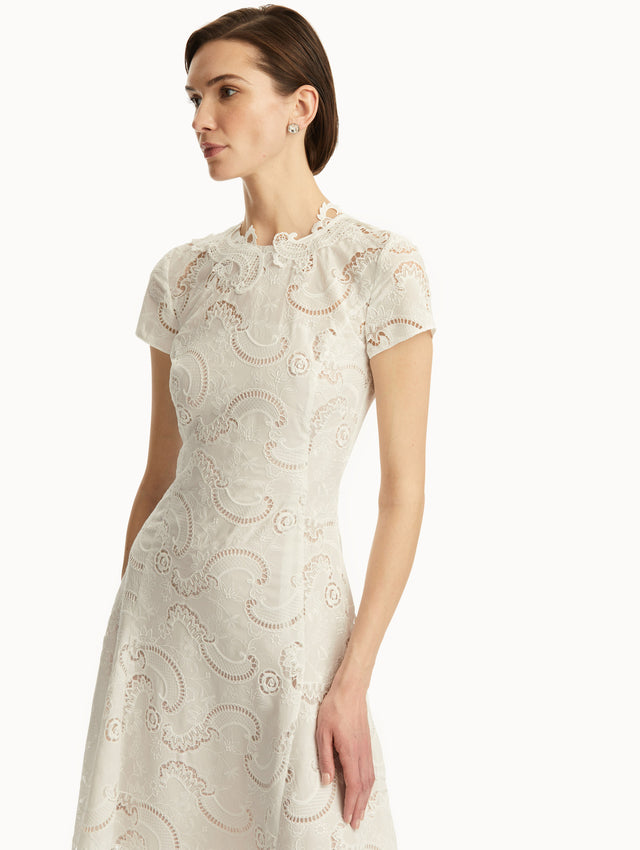 Short sleeve white lace dress. Zoom View.