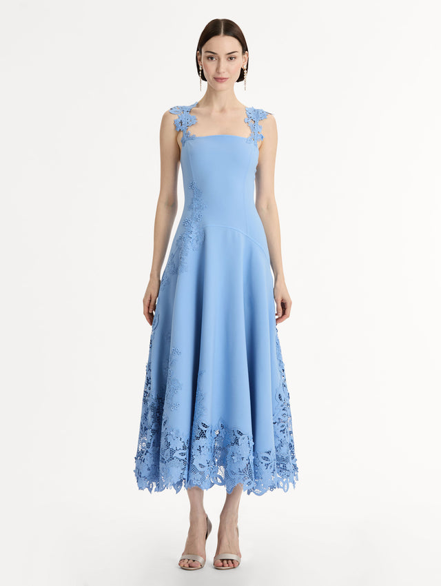Blue Midi Dress, Fitted Bodice, Pleated Skirt, Flower Guipure straps and hem. Front View.