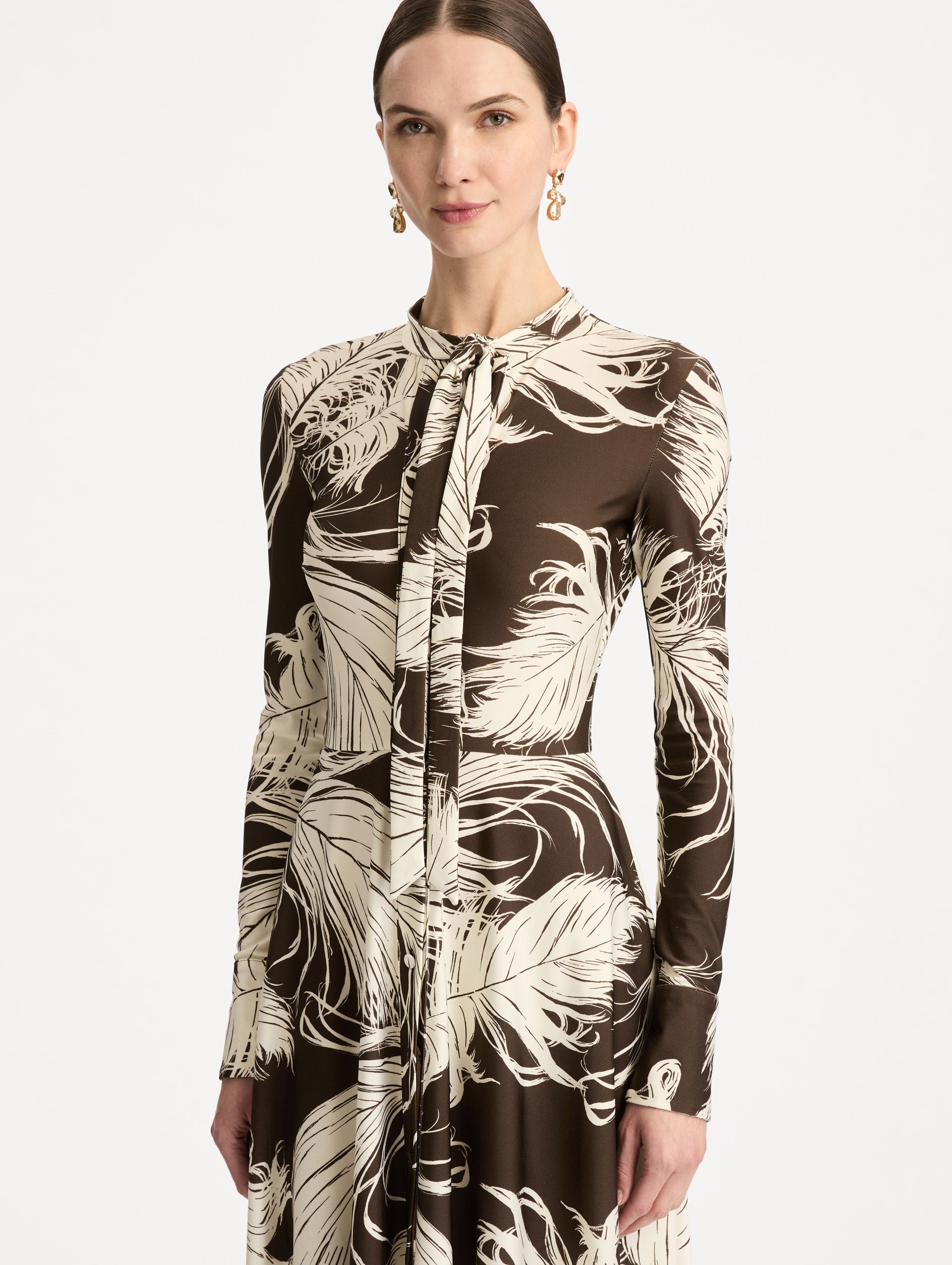 Brown and Ivory Feather Jersey Dress with long sleeves and neck tie. Zoom View.