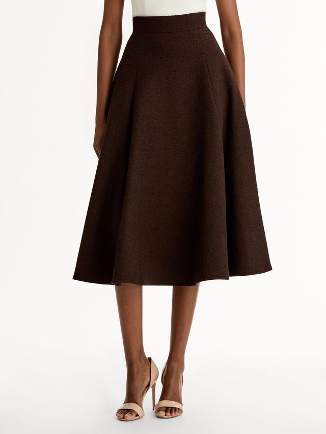 Chocolate Wool Tweed Pleated Skirt with pockets. High-waisted with Flared Fit. Front View, Close Up.