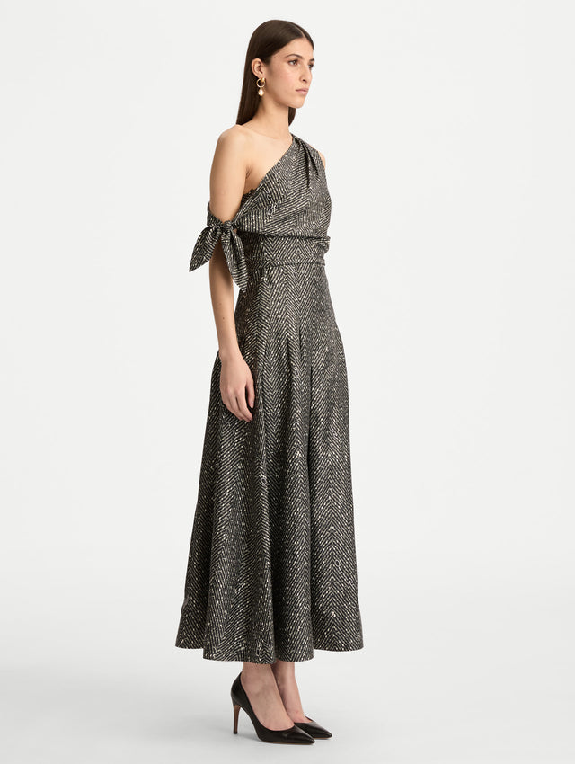 Black and Ivory Chevron Silk Twill Dress with one shoulder draped neckline and tie sleeve detail. Side View.
