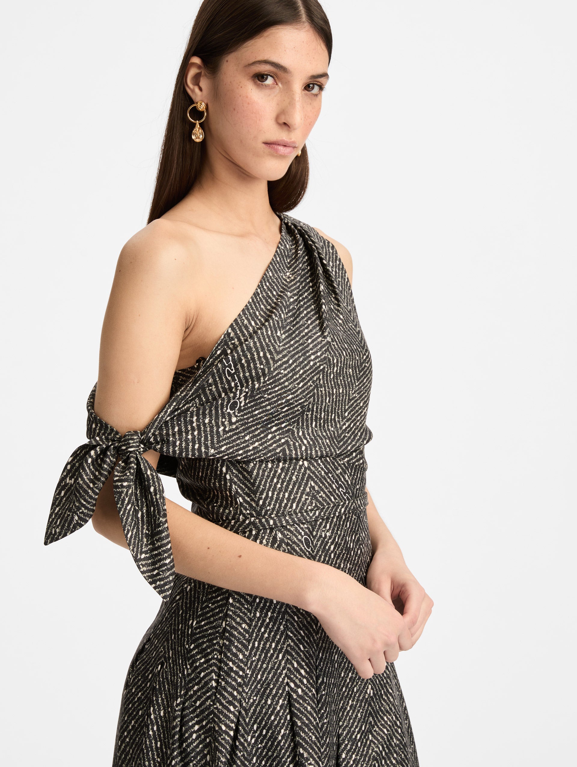 Black and Ivory Chevron Silk Twill Dress with one shoulder draped neckline and tie sleeve detail. Zoom View.