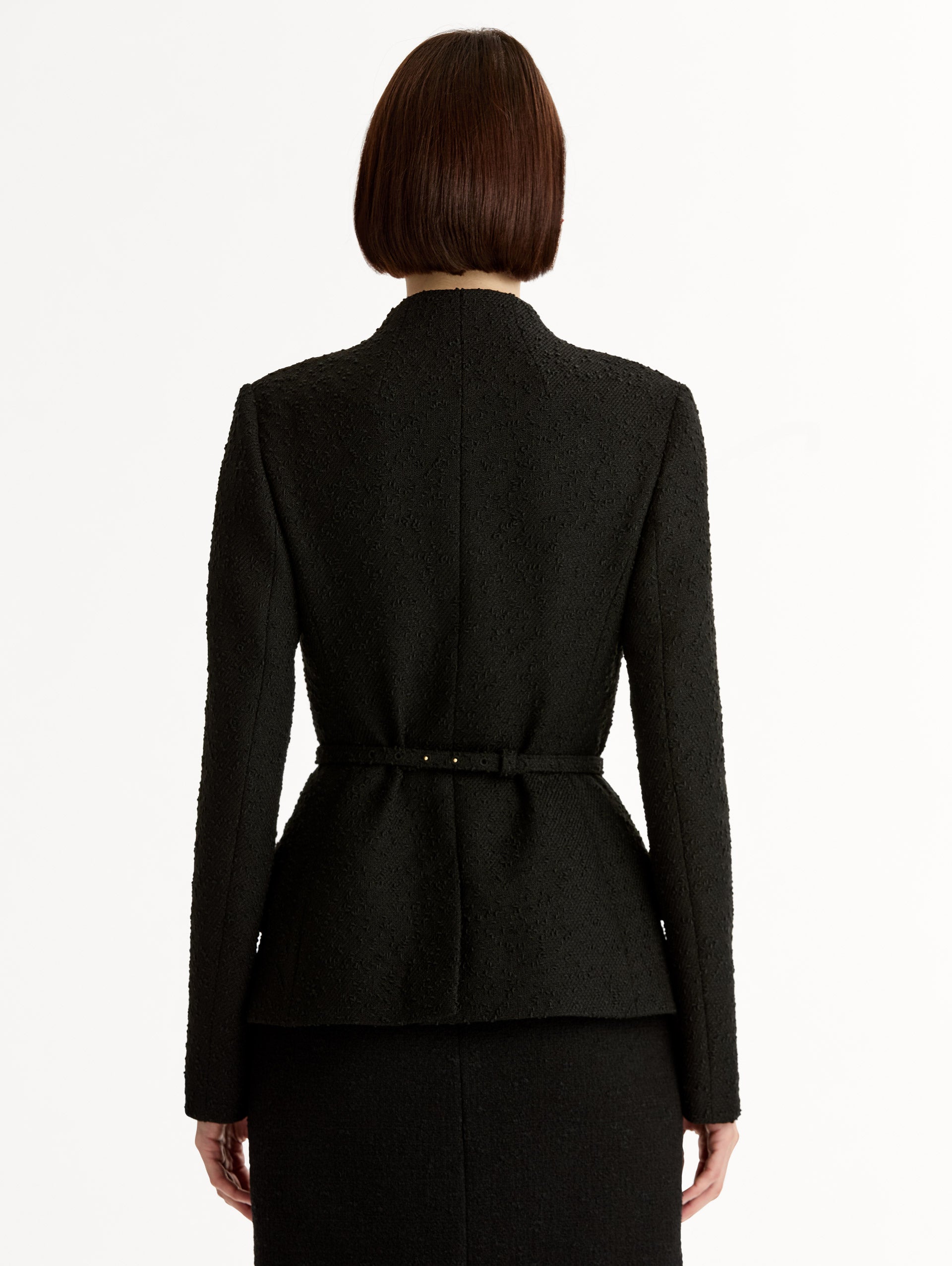 Black Cyclamen Belt Tweed Jacket, long sleeve, fitted, gold belt buckle. Back View.