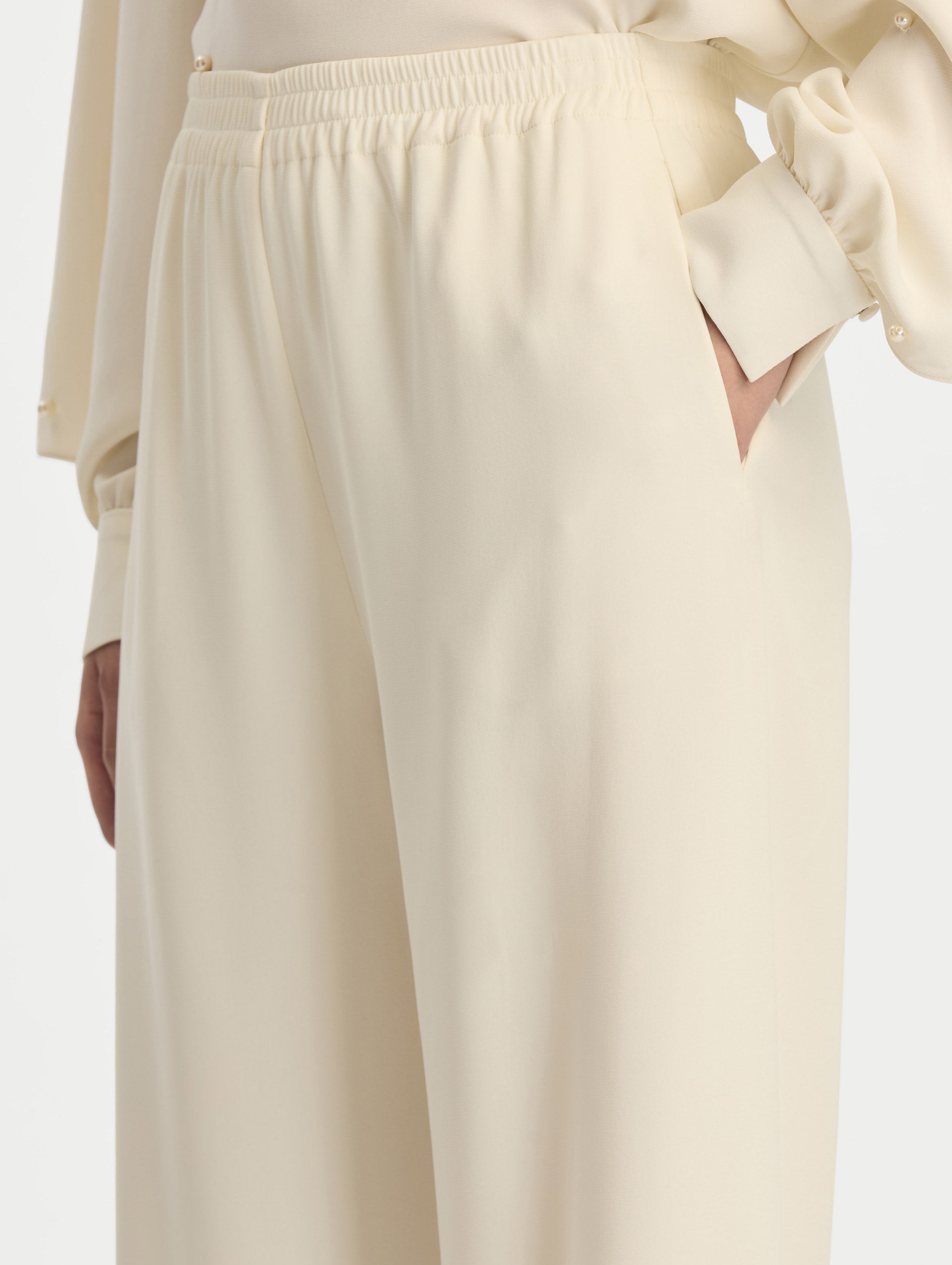 Ivory Silk Georgette Wide Leg Pant with an elastic waistband. Zoom View.