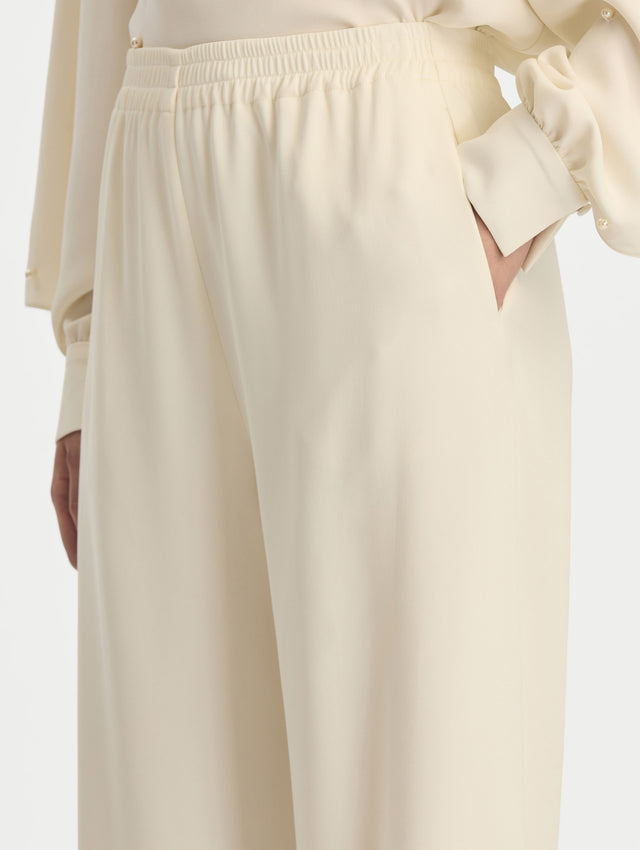 Ivory Silk Georgette Wide Leg Pant with an elastic waistband. Zoom View.