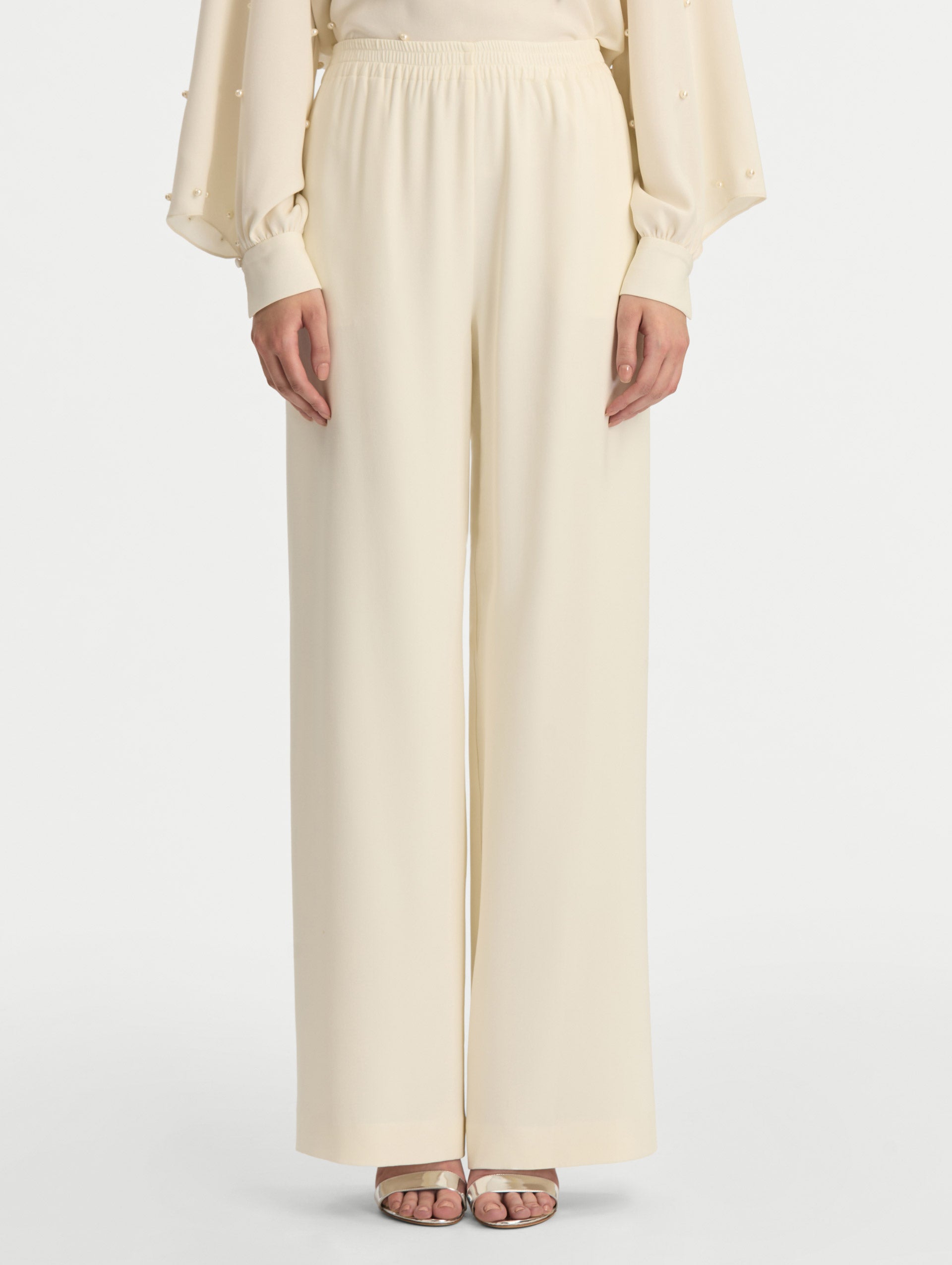Ivory Silk Georgette Wide Leg Pant with an elastic waistband. Front View.